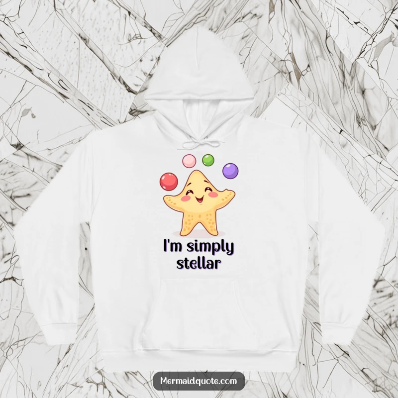 Funny Starfish Juggling Hoodie: Cozy hoodie with a playful starfish juggling pearls with a mischievous grin, perfect for sea lovers.