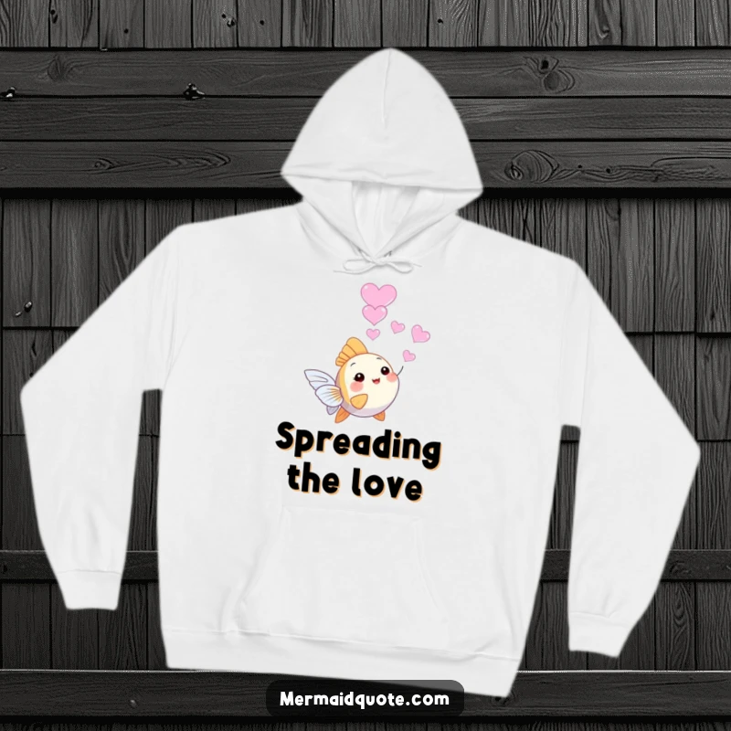 Funny tiny angelfish hoodie, happily blowing a trail of heart-shaped bubbles, perfect for spreading warmth and affection.