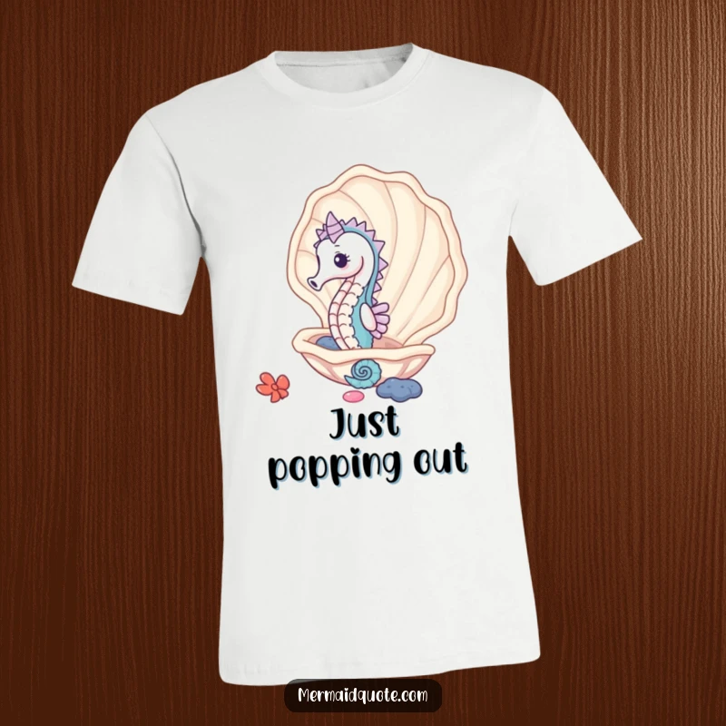 Funny cute seahorse peeking from a giant clam shell, a whimsical t-shirt for ocean exploration.