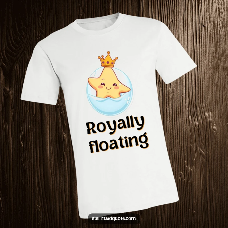 Funny t-shirt showcasing a smiling starfish donning a tiny crown while floating on a bubble, embodying playful royalty and joy.